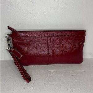 Coach red patent leather large wristlet with navy interior